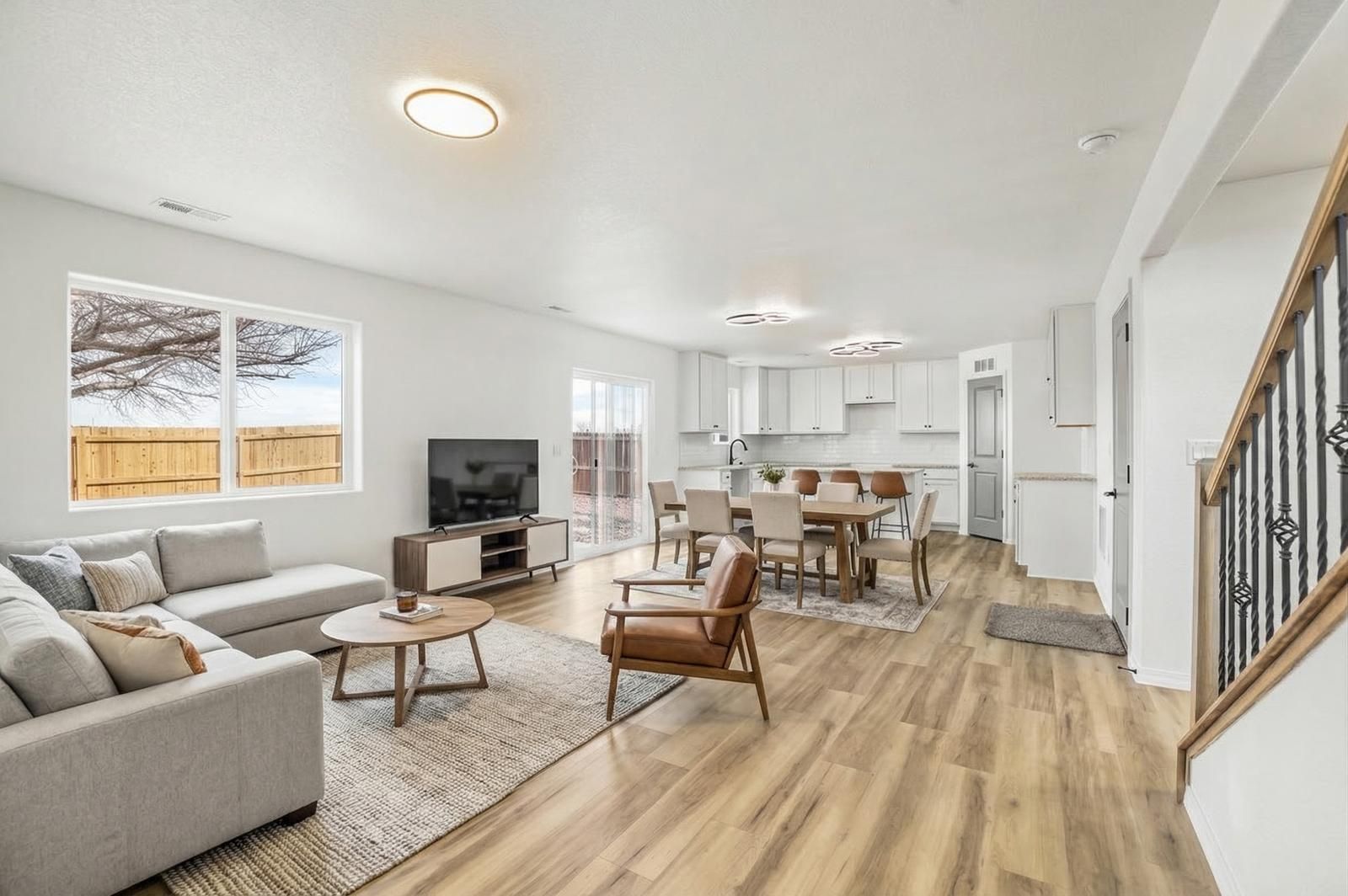 Chieftan open concept living and dining area with LVP flooring