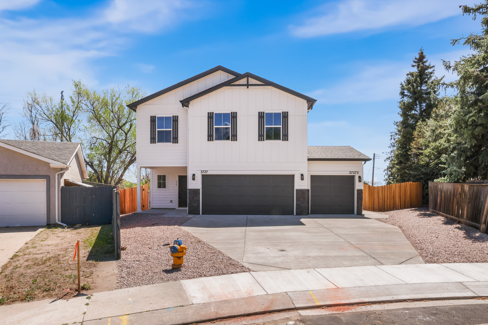 Lander new construction single-family home with attached ADU exterior, Colorado Springs